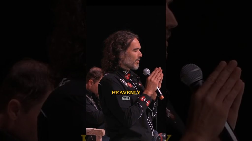 Russell Brand Prays Over Crowd