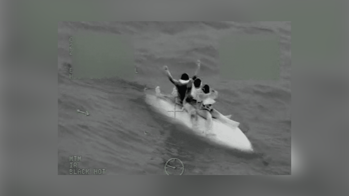 Video shows U.S. Coast Guard rescue 3 stranded boaters from their capsized boat