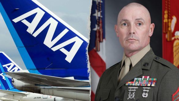 Marine restrains man who tried to open emergency exit on flight: report