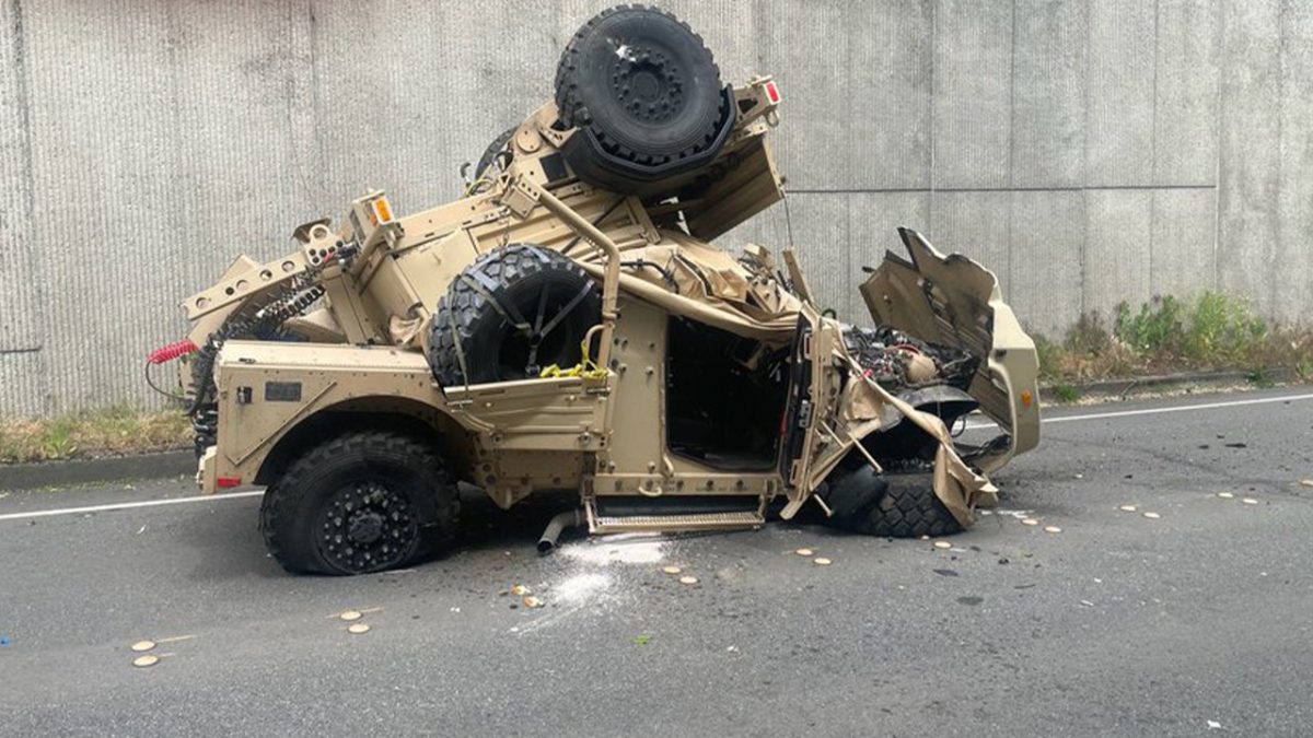 Humvee plunges nearly 30 feet from highway with injuries reported