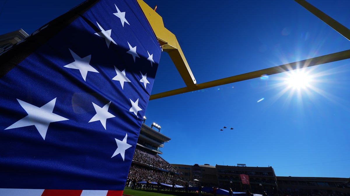 Parachutist at Armed Forces Bowl gets caught in wire, falls into crowd