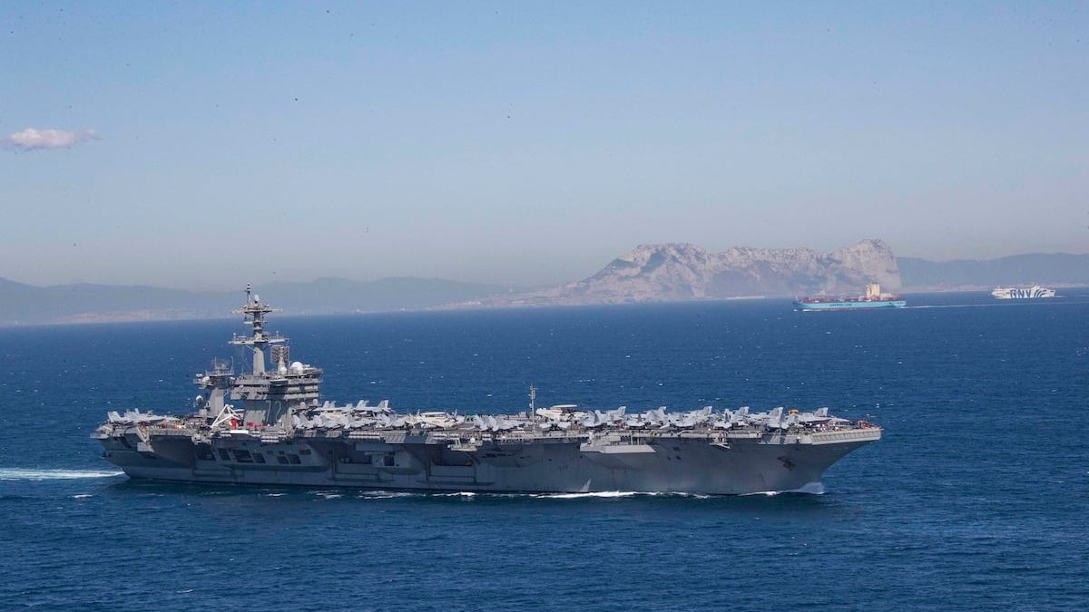 Iran puts ‘fingers on trigger’ as US armada arrives in Middle East