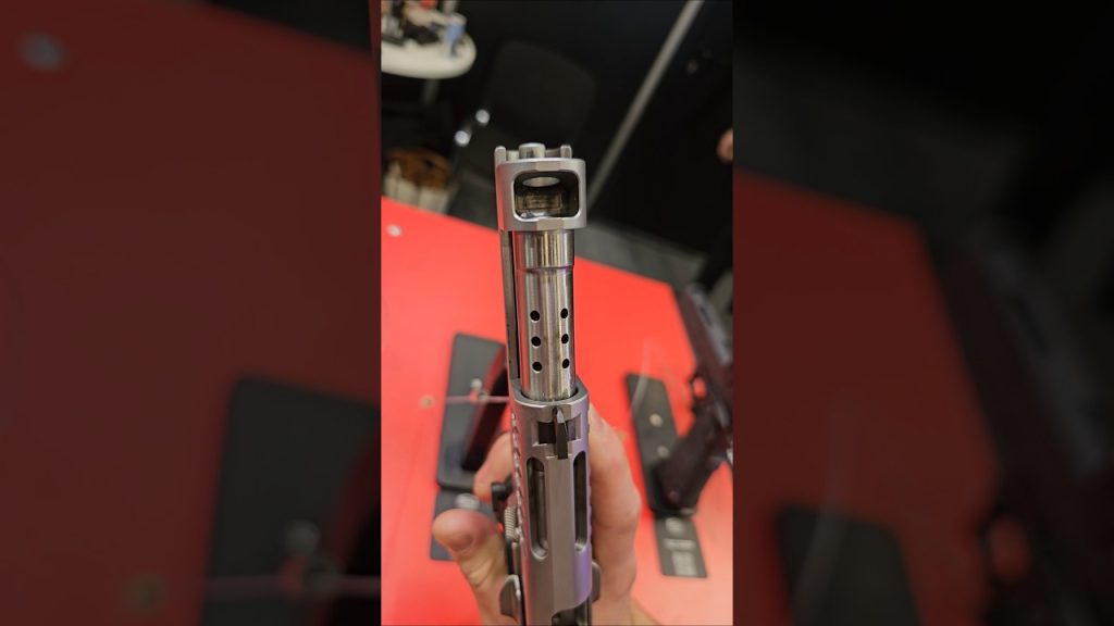 Ported and compensated pistol