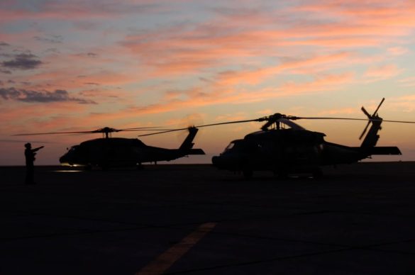Navy’s ‘dinosaur’ carrier delivery plane flies into sunset