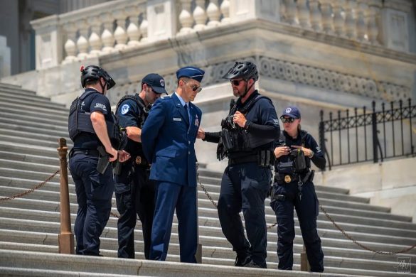 Air Force major arrested on Capitol steps during protest calling for Trump impeachment