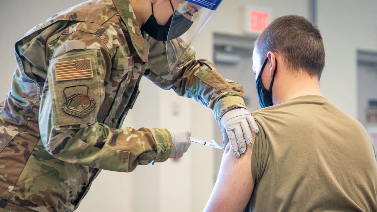 Trump promised redemption for troops who refused COVID shots. A year later, many are still waiting.